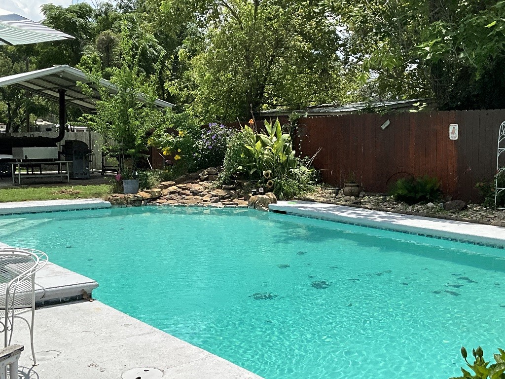 416 Division Street Jewett, TX 75846 - Photo 26 of 36 a backyard of a house with lots of green space