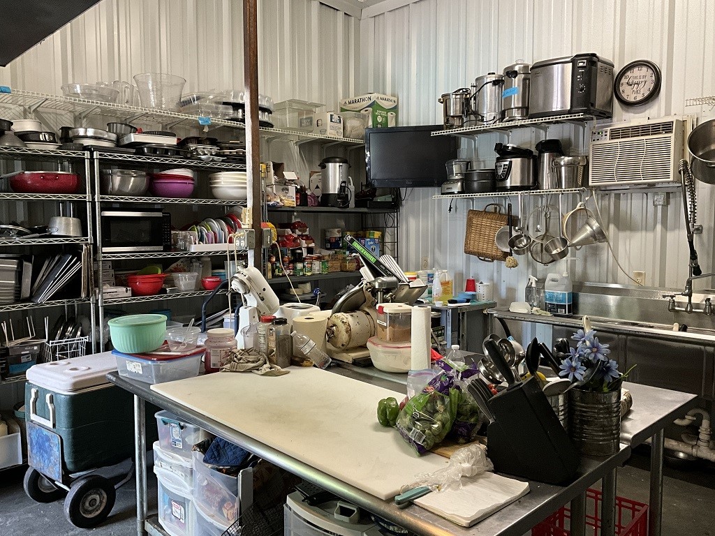 416 Division Street Jewett, TX 75846 - Photo 34 of 36 a room with gym equipment and a view of living room