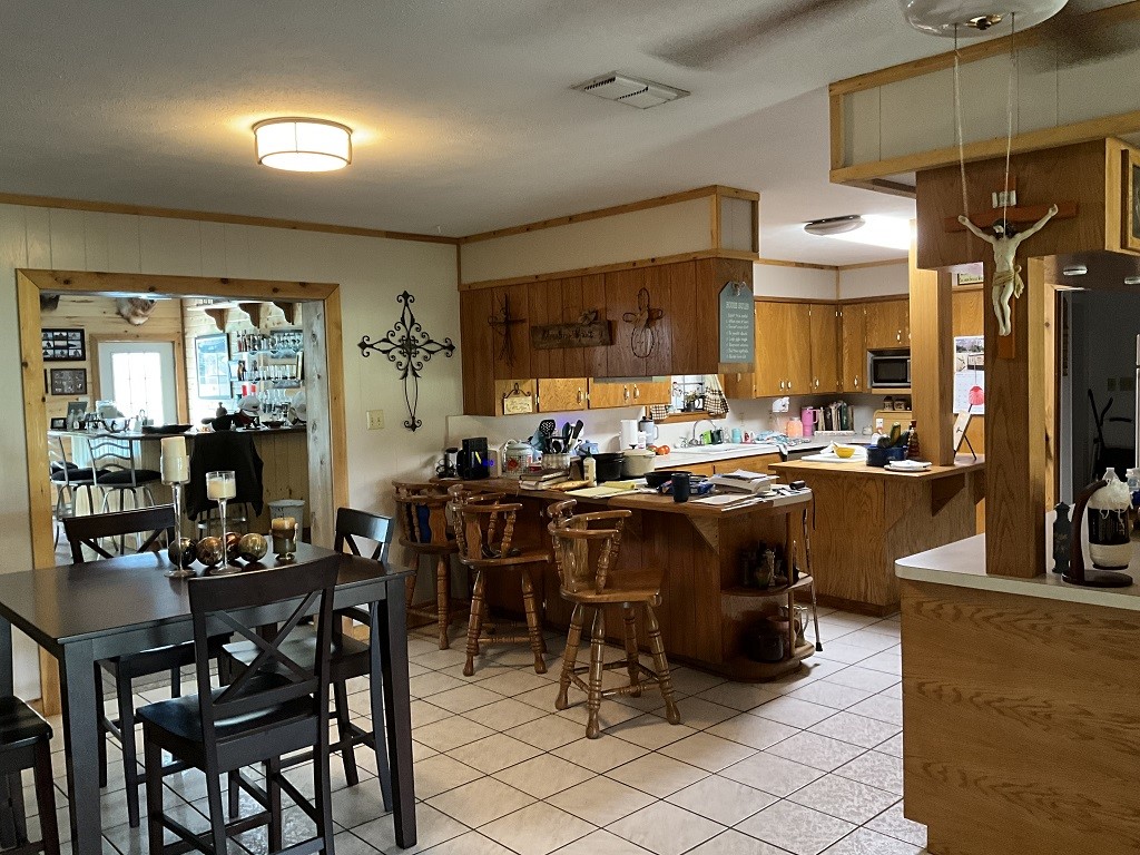 416 Division Street Jewett, TX 75846 - Photo 9 of 36 a view of a dining room with furniture