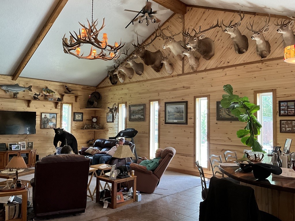 416 Division Street Jewett, TX 75846 - Photo 10 of 36 a living room with furniture a flat screen tv and a fireplace