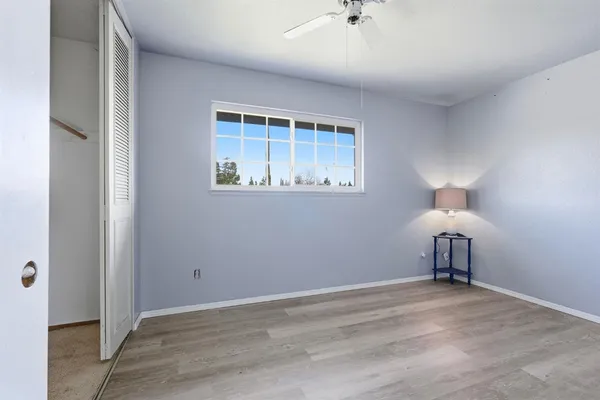 a bathroom with a granite countertop sink mirror and double