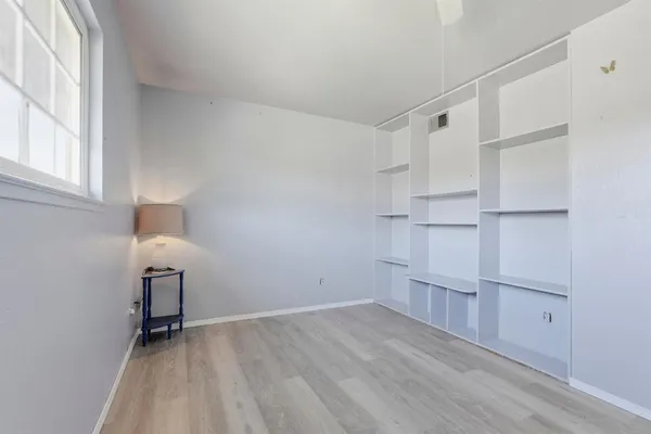 a view of backyard with swimming pool and patio