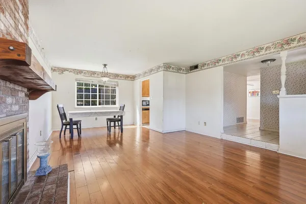 a kitchen with a sink and a window