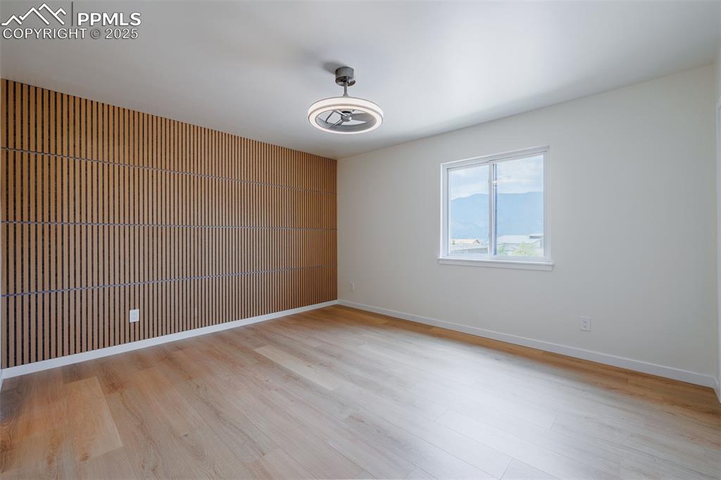 2905 Mesa Road, Unit D Colorado Springs, CO 80904 - Photo 20 of 34 an empty room with a fan & a window