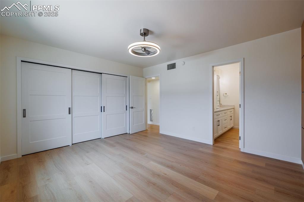 2905 Mesa Road, Unit D Colorado Springs, CO 80904 - Photo 24 of 34 a view of a room with wooden floor