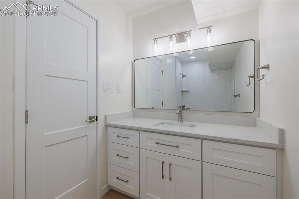 2905 Mesa Road, Unit D Colorado Springs, CO 80904 - Photo 29 of 34 a bathroom with a shower and a sink