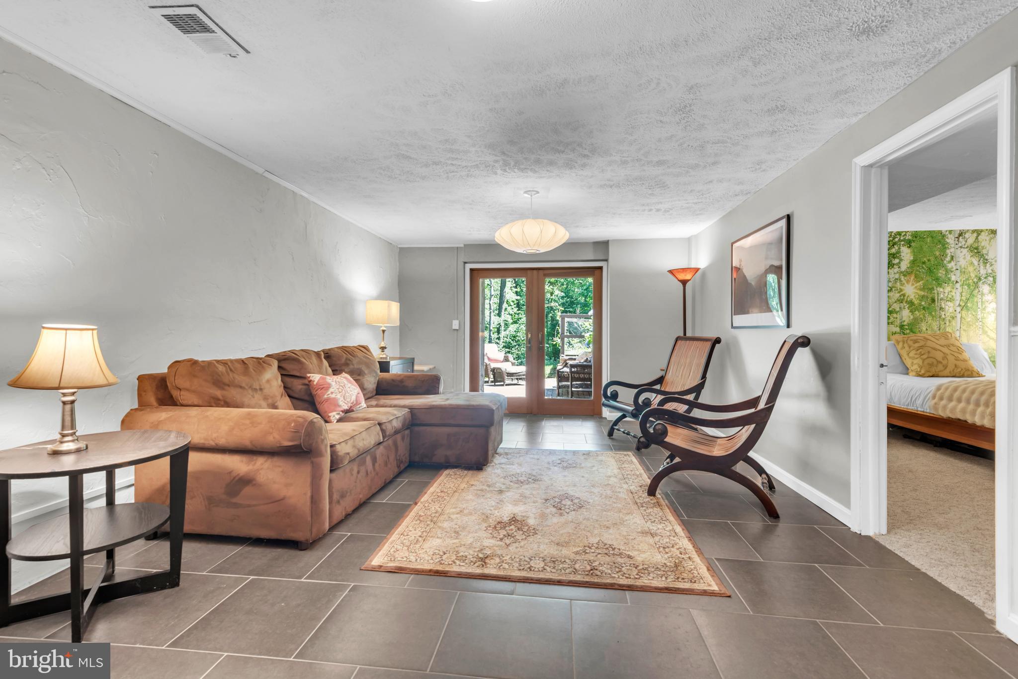 1870 Poplar Road Annapolis, MD 21401 - Photo 23 of 51 Lower level family room leads out to patio area.