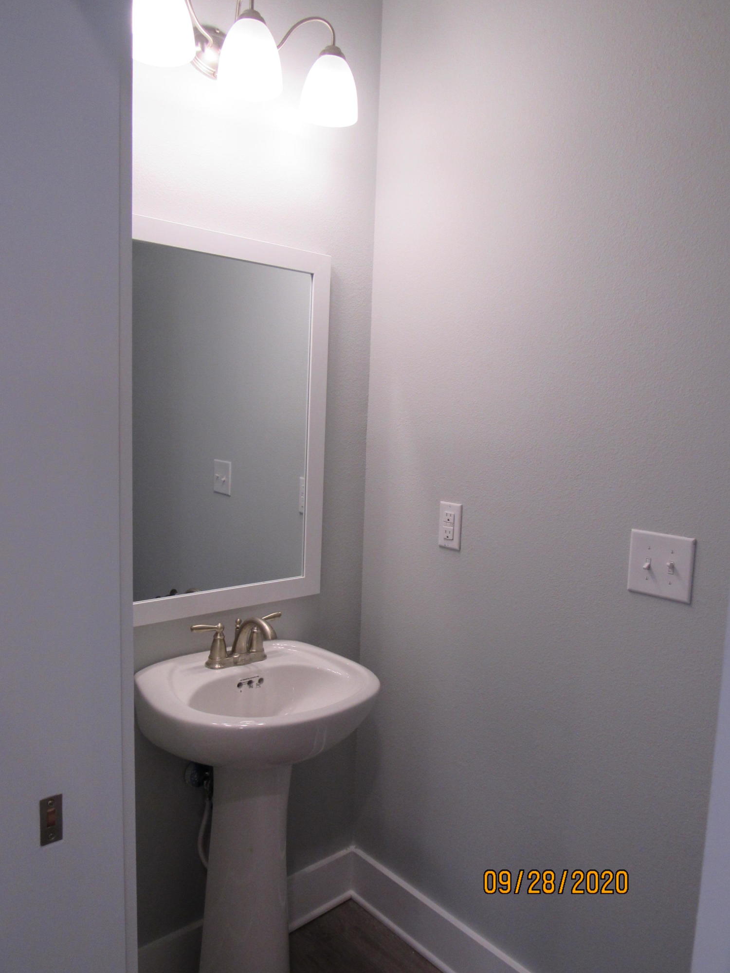 45 South Sand Palm Road Freeport, FL 32439 - Photo 6 of 19 a bathroom with a sink and mirror