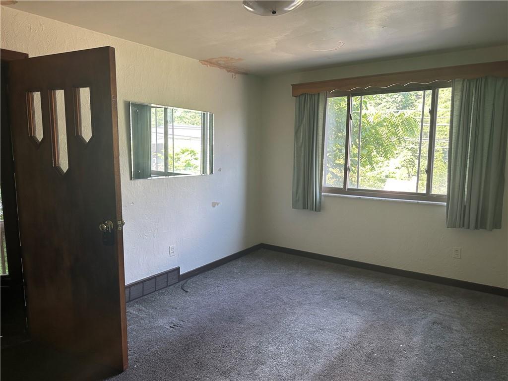 998 Chartiers Avenue Carnegie, PA 15106 - Photo 4 of 10 a view of an empty room with a window