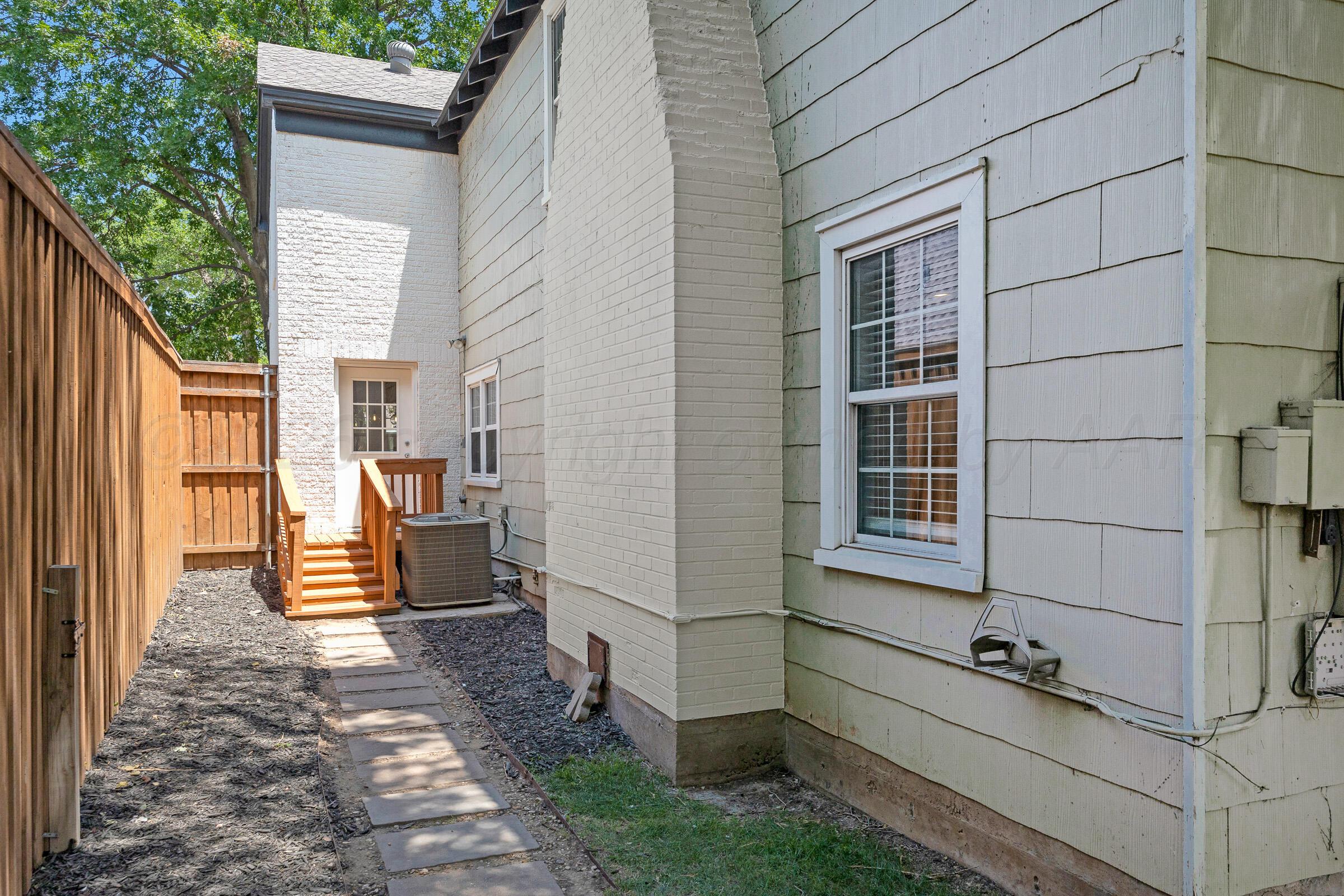 2102 South Hayden Street Amarillo, TX 79109 - Photo 43 of 44 a backyard of a house with outdoor seating
