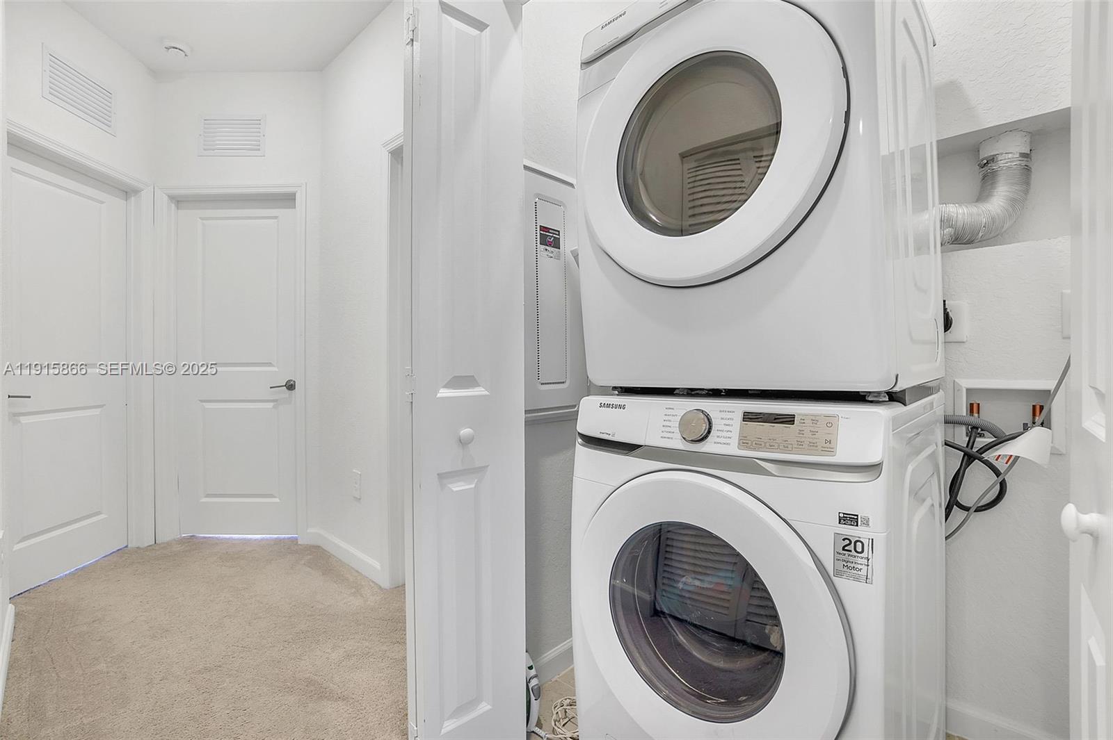 12859 Southwest 243rd Terrace Homestead, FL 33032 - Photo 16 of 38 a view of a storage and utility room with a washer dryer