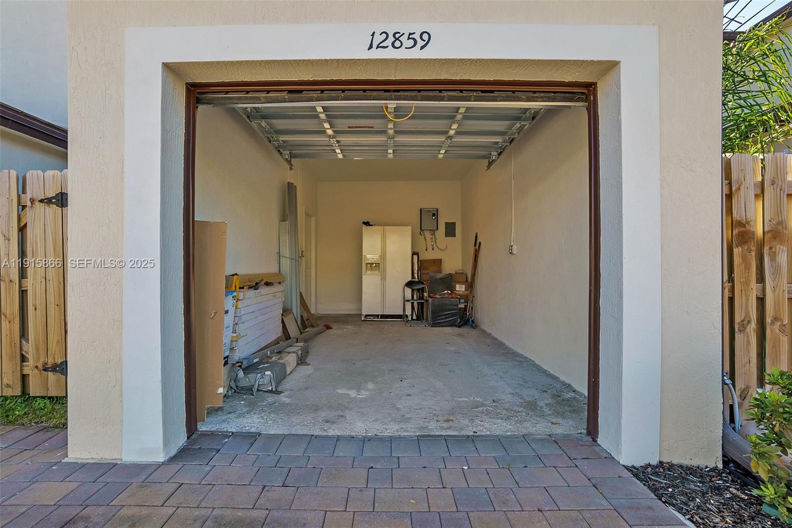 12859 Southwest 243rd Terrace Homestead, FL 33032 - Photo 26 of 38 a view of a hallway with a outdoor space