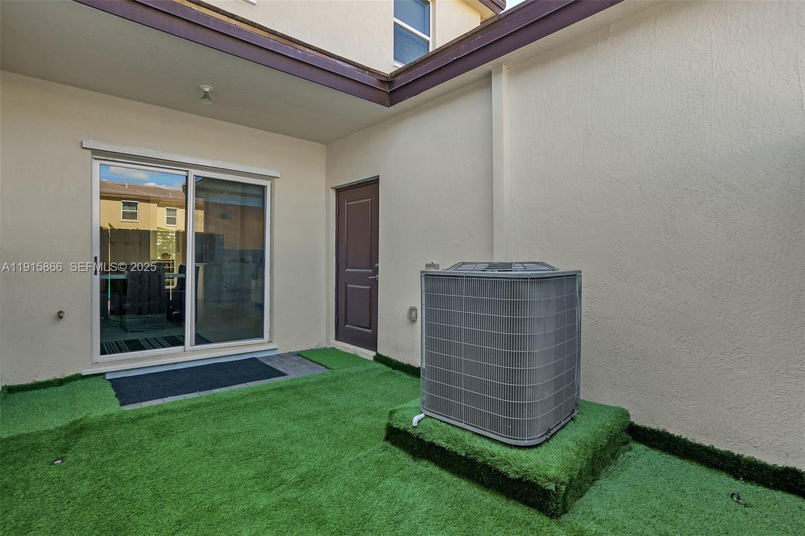 12859 Southwest 243rd Terrace Homestead, FL 33032 - Photo 28 of 38 front view of a room with a staircase