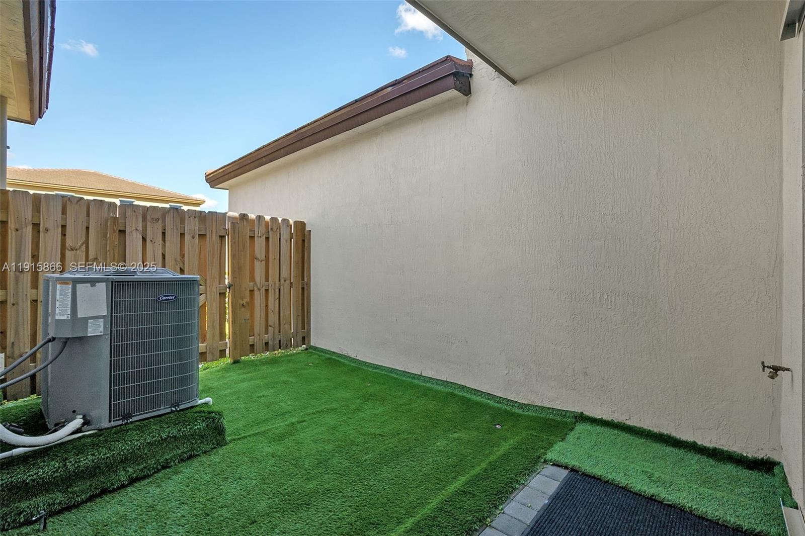 12859 Southwest 243rd Terrace Homestead, FL 33032 - Photo 29 of 38 a view of a backyard with pathway