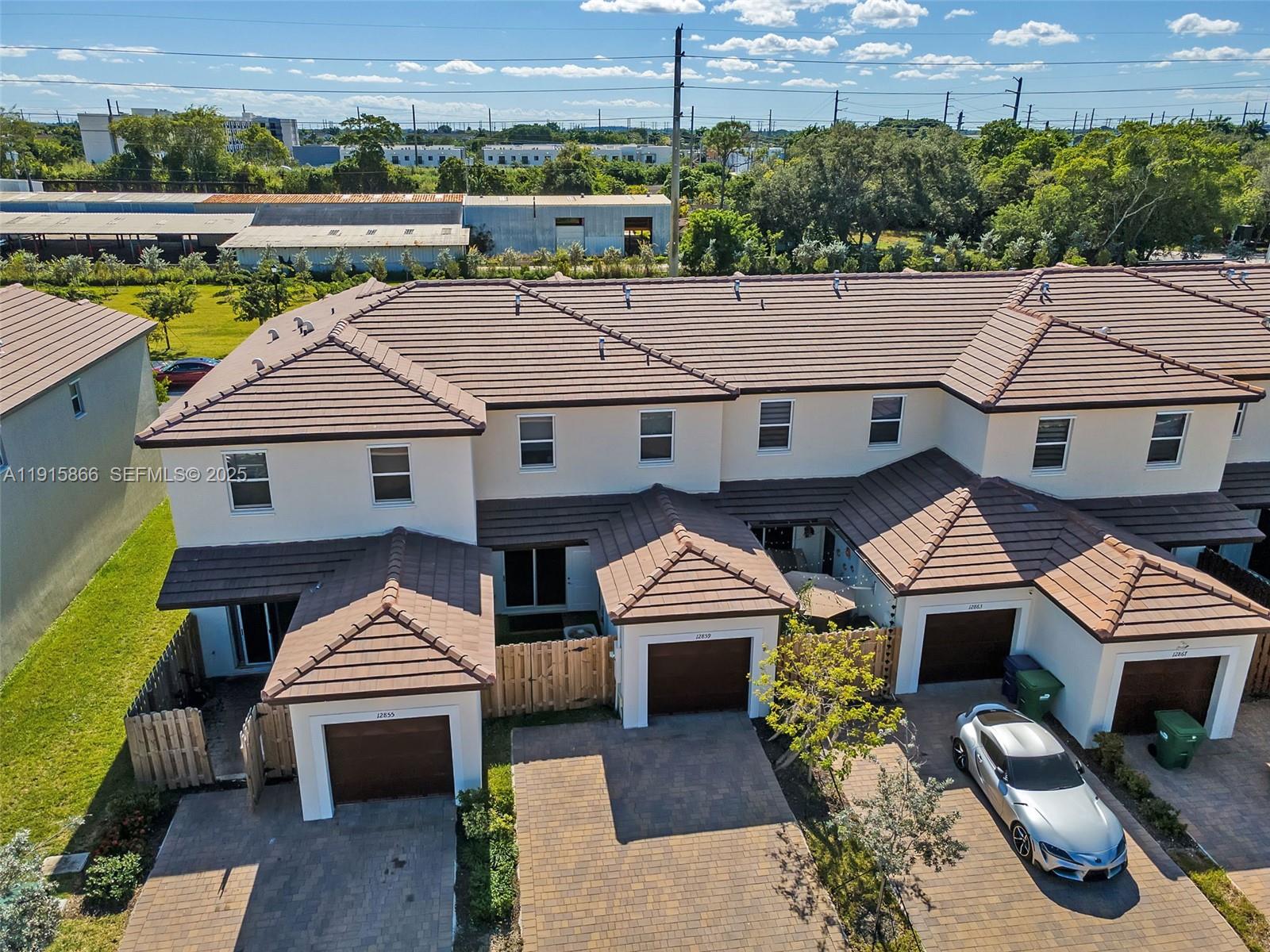 12859 Southwest 243rd Terrace Homestead, FL 33032 - Photo 38 of 38 an aerial view of a house with a garden and sitting area