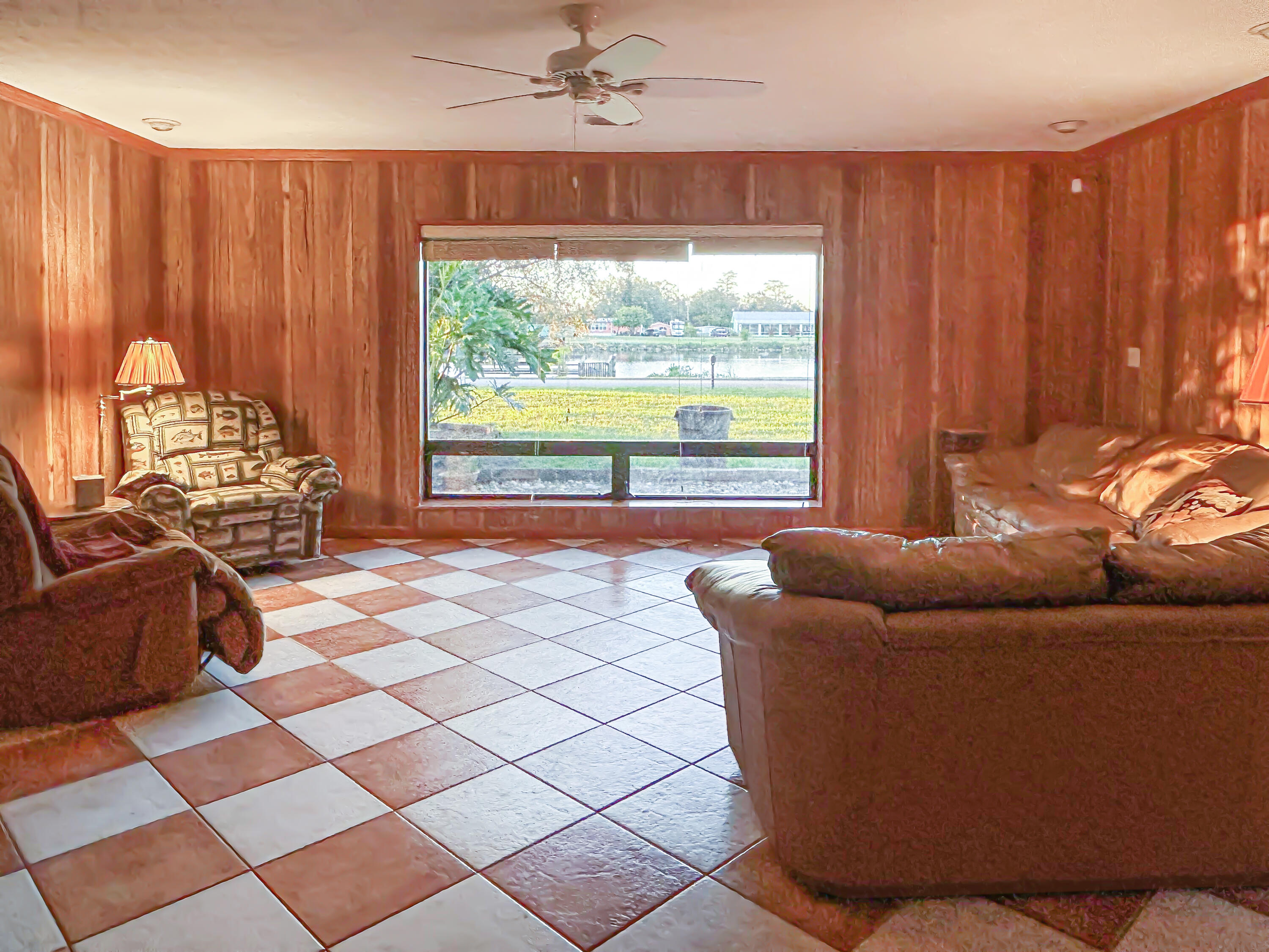2531 River Road Moore Haven, FL 33471 - Photo 12 of 30 a living room with furniture and a large window