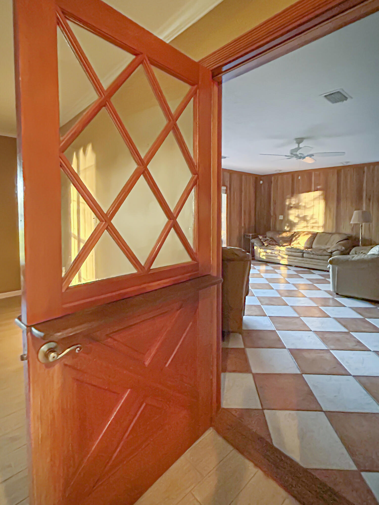 2531 River Road Moore Haven, FL 33471 - Photo 14 of 30 a living room with a open dining table and a large window