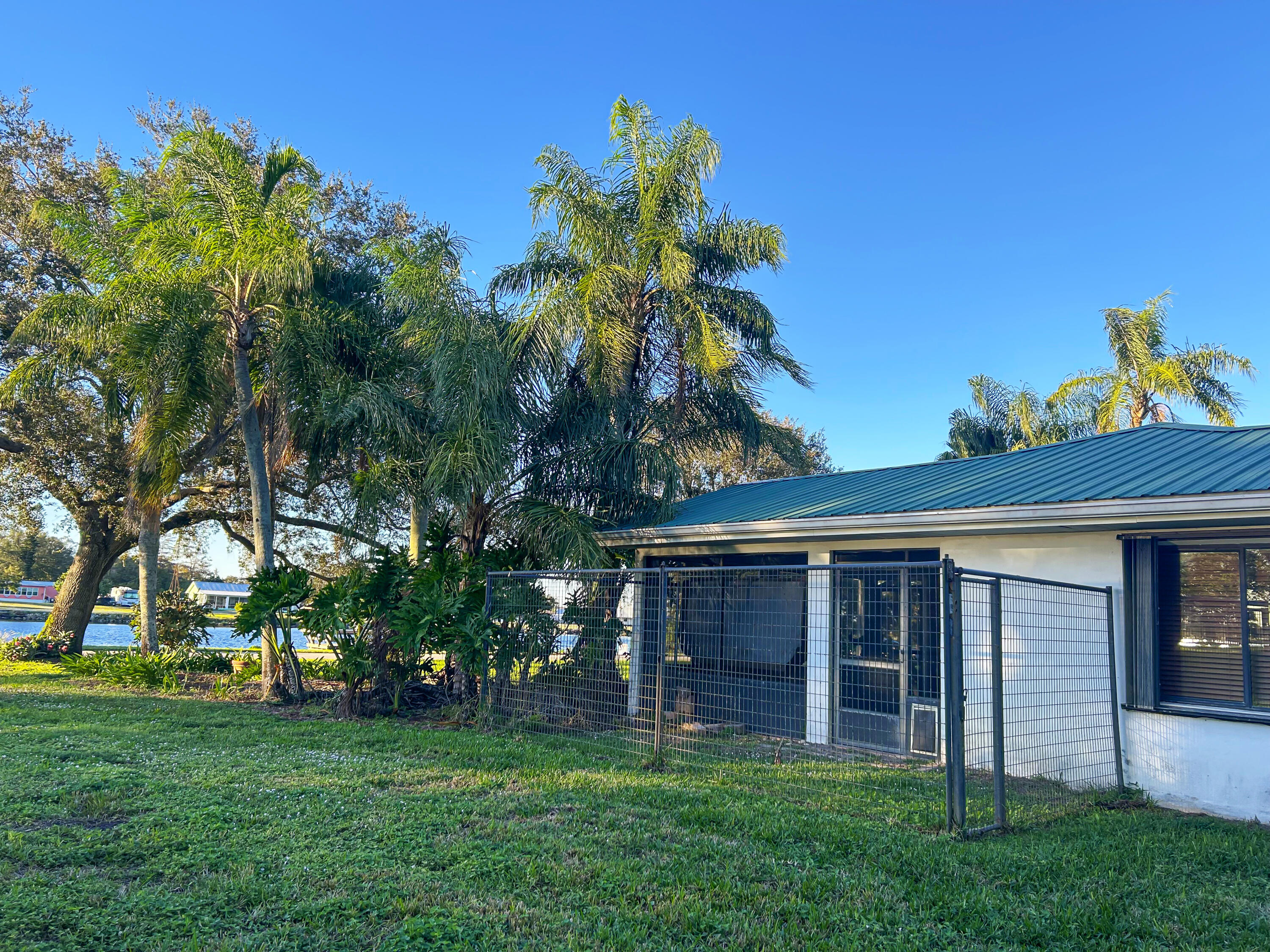 2531 River Road Moore Haven, FL 33471 - Photo 26 of 30 front view of a house with a big yard