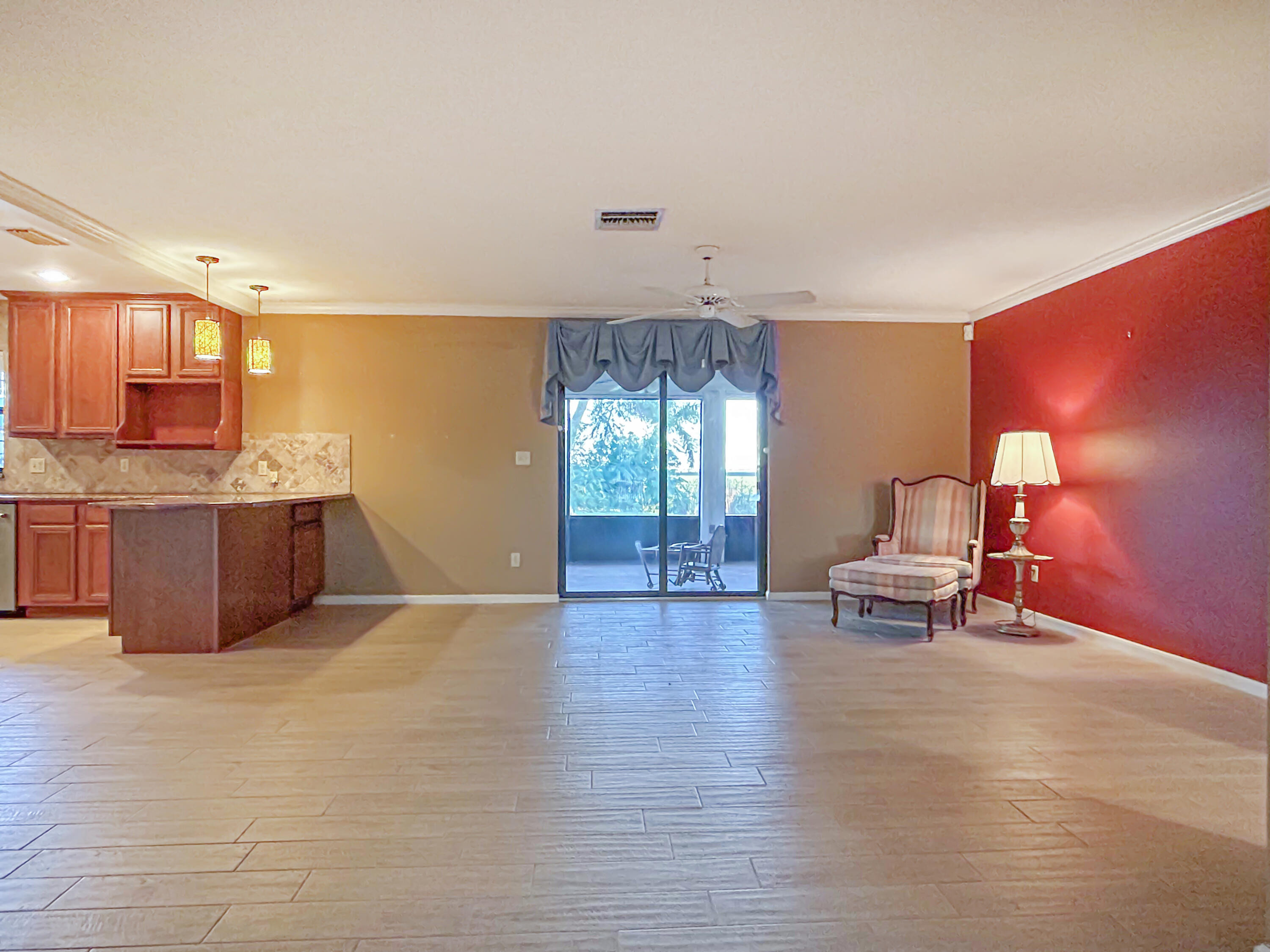 2531 River Road Moore Haven, FL 33471 - Photo 10 of 30 a living room with furniture and a kitchen