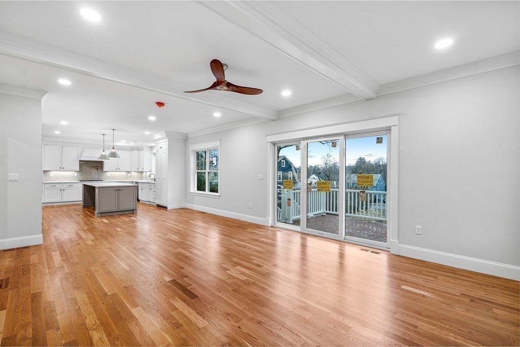 49 Allen Road Winchester, MA 01890 - Photo 15 of 38 a view of an empty room with wooden floor and a window