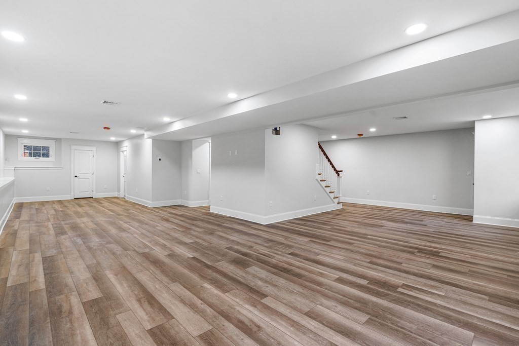 49 Allen Road Winchester, MA 01890 - Photo 35 of 38 a view of empty room with wooden floor
