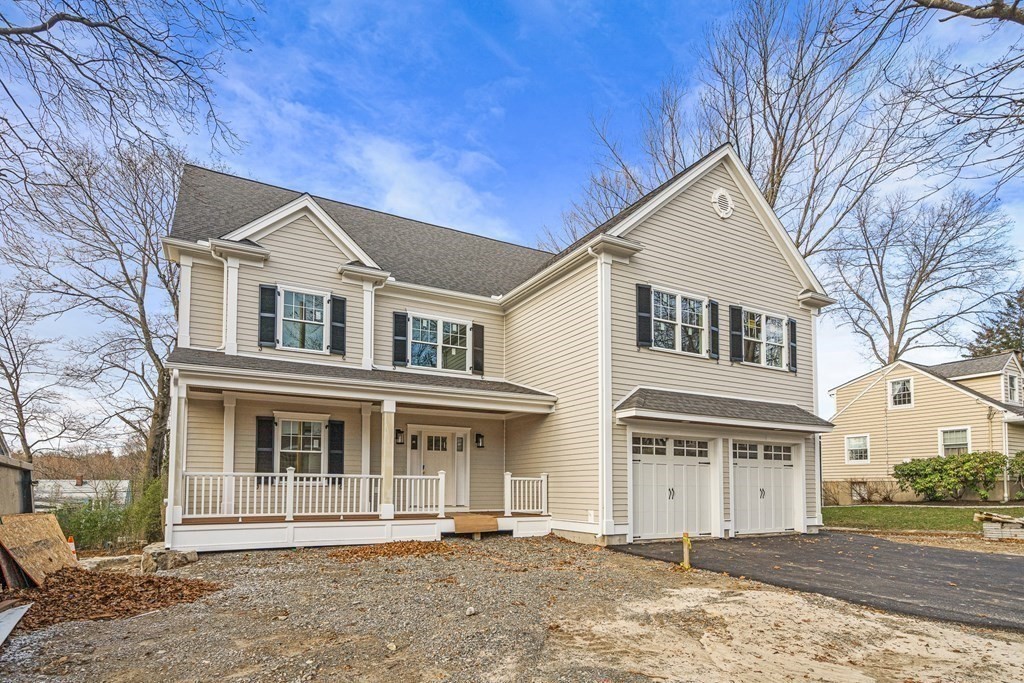 49 Allen Road Winchester, MA 01890 - Photo 38 of 38 a front view of a house with a yard