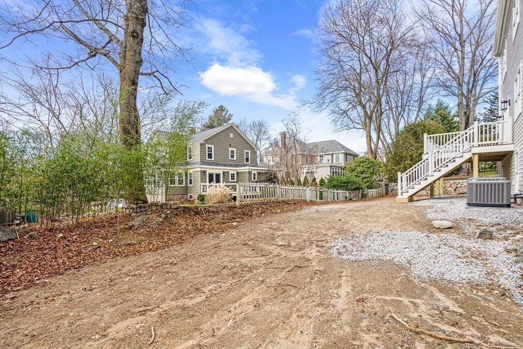49 Allen Road Winchester, MA 01890 - Photo 5 of 38 a view of a house with a yard