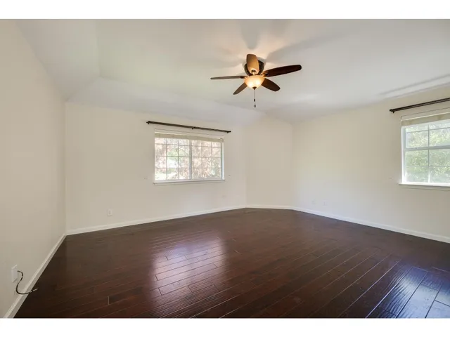 a backyard of a house with lots of green space
