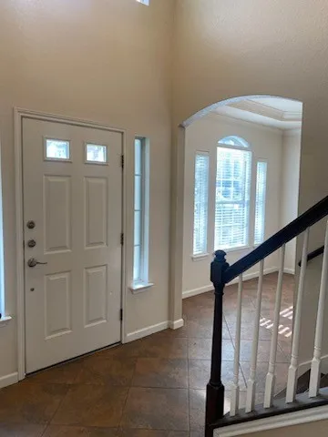 a living room with a fireplace and a table