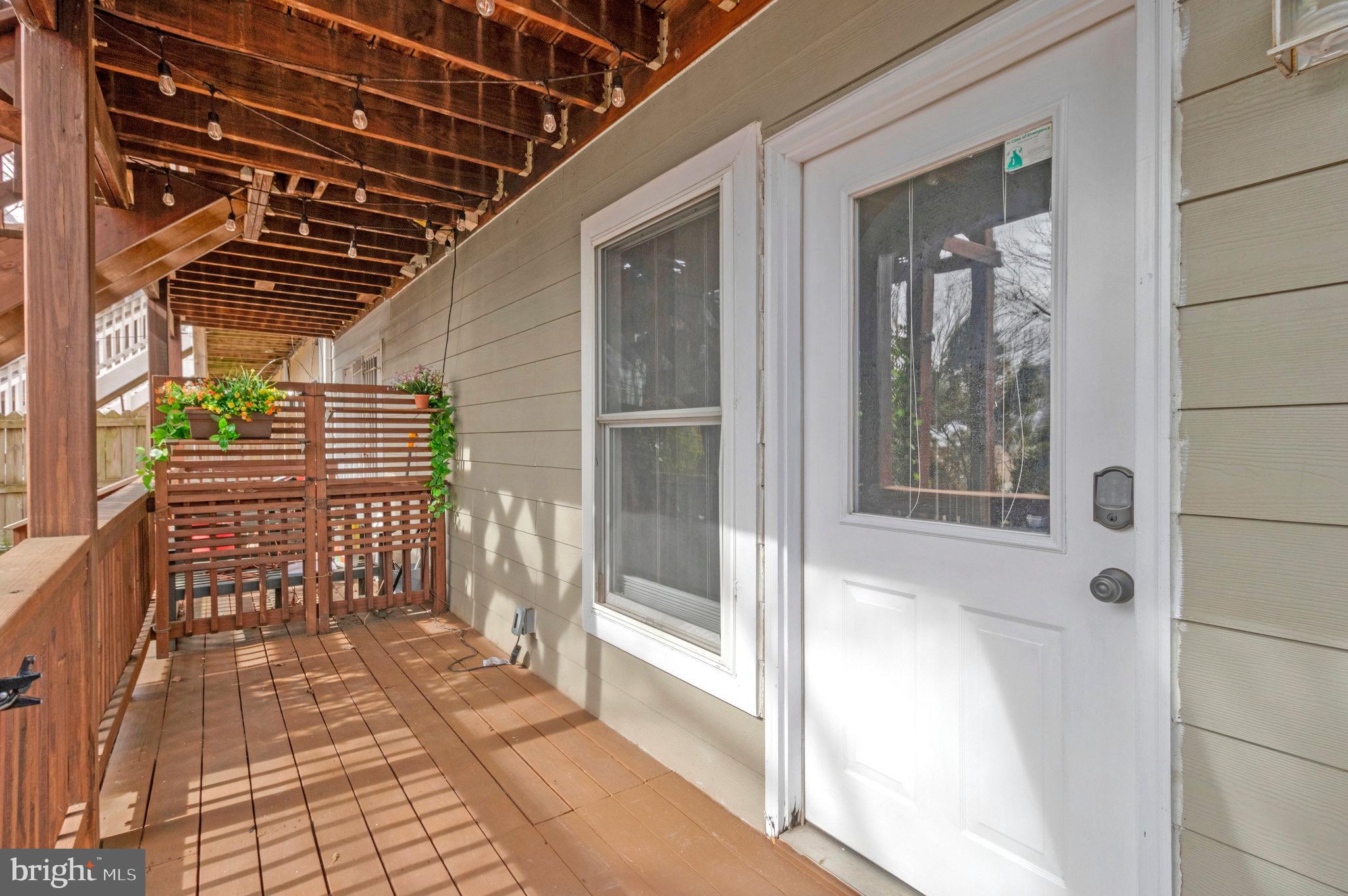 1519 Constitution Avenue Northeast, Unit 101 Washington, DC 20002 - Photo 15 of 32 a view of a balcony with door