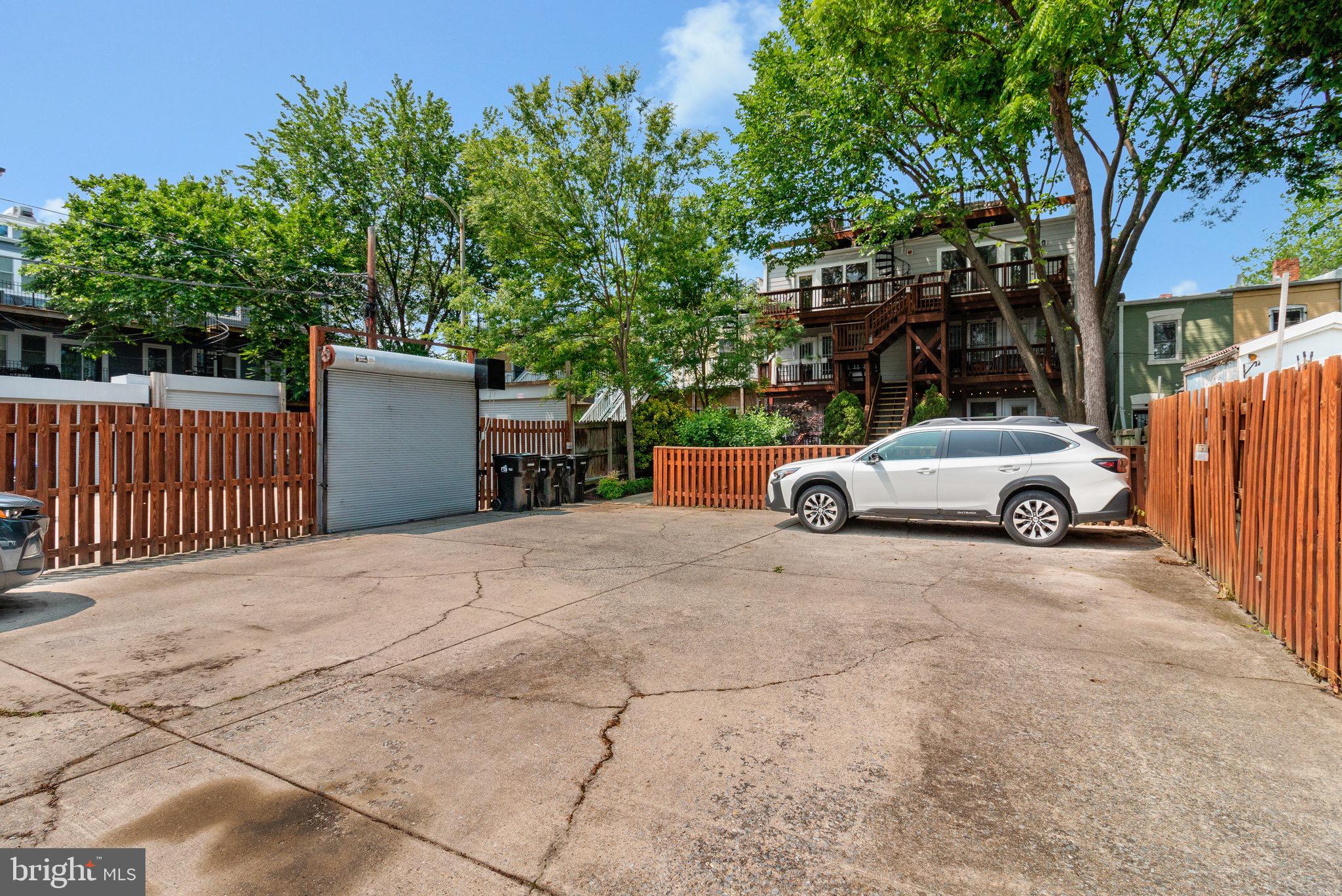 1519 Constitution Avenue Northeast, Unit 101 Washington, DC 20002 - Photo 21 of 32 a car parked on the side of a street