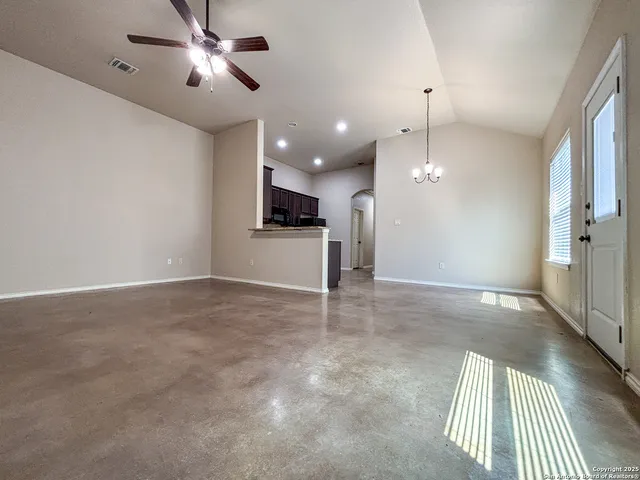 a view of a kitchen with a sink and a stove