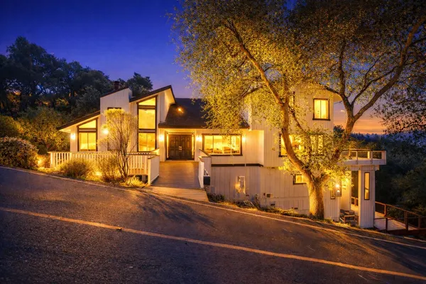 front view of a house with a small yard