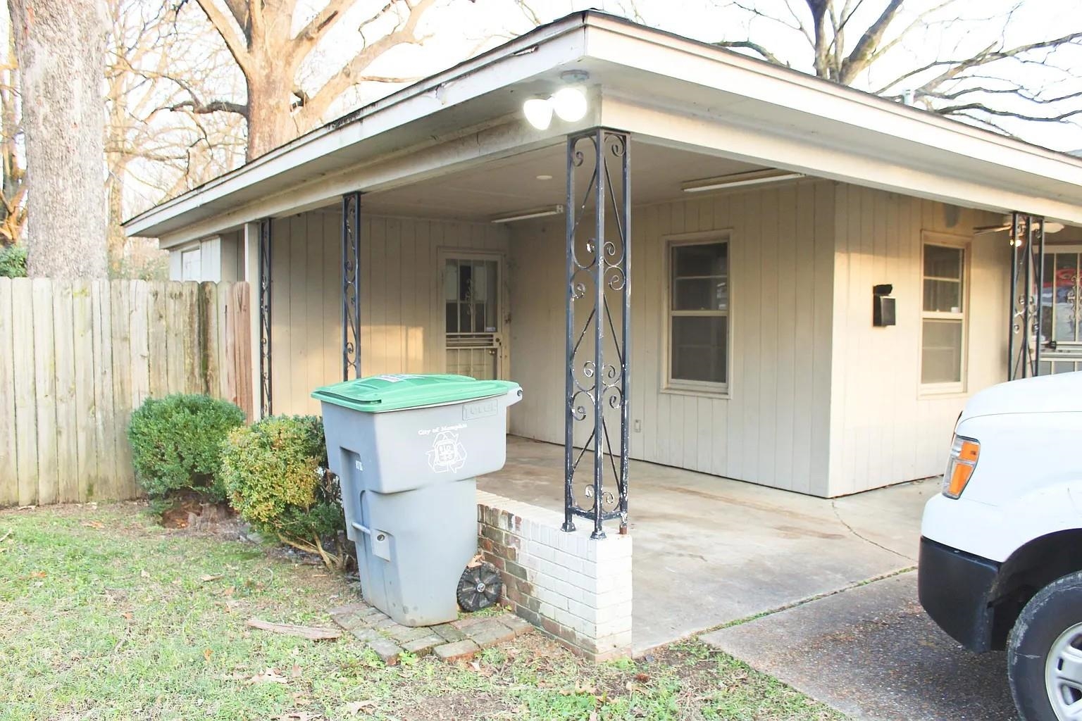 1606 Sea Isle Road Memphis, TN 38117 - Photo 6 of 7 a front view of a house with a yard
