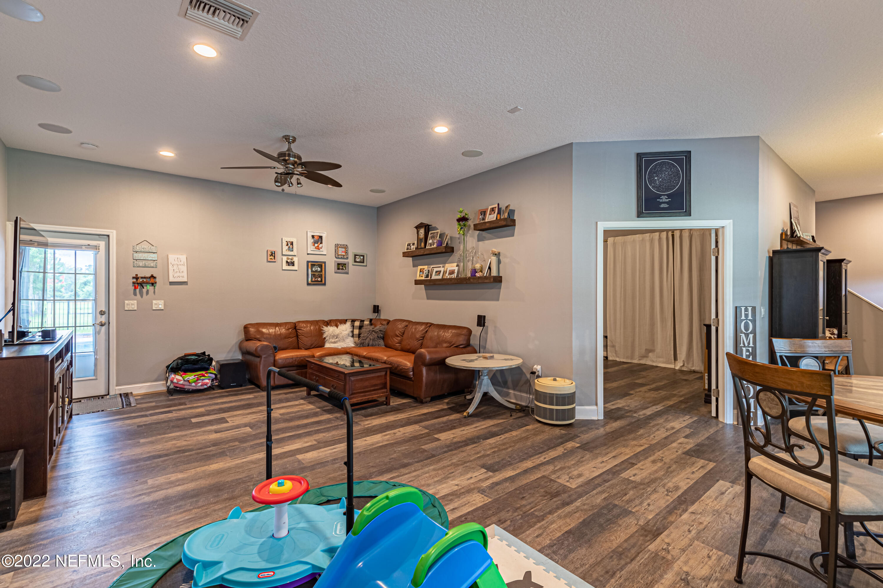 1830 Bennett Road St. Augustine, FL 32092 - Photo 13 of 45 a living room with furniture and wooden floor