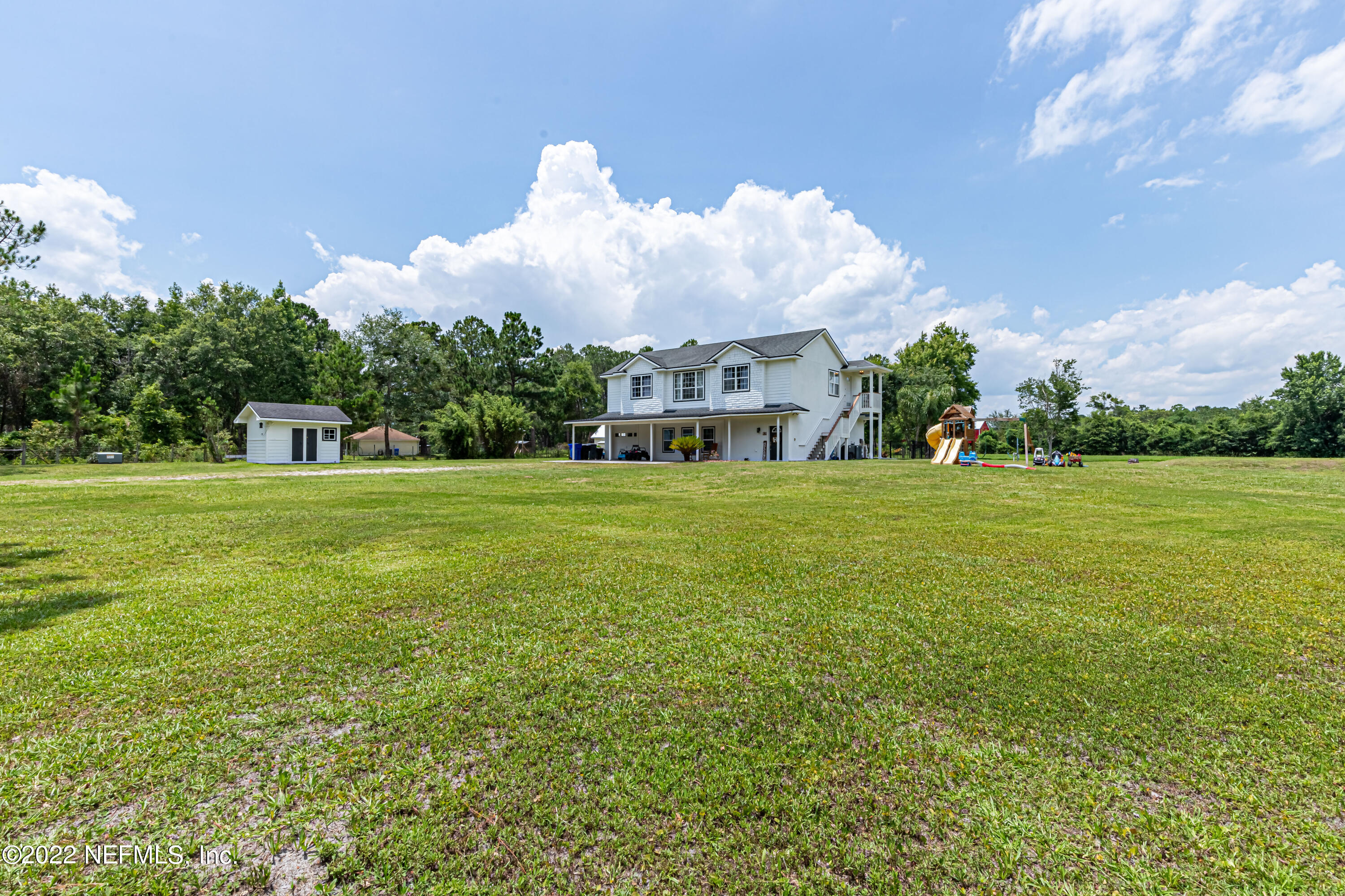 1830 Bennett Road St. Augustine, FL 32092 - Photo 29 of 45 a view of a building in a big yard