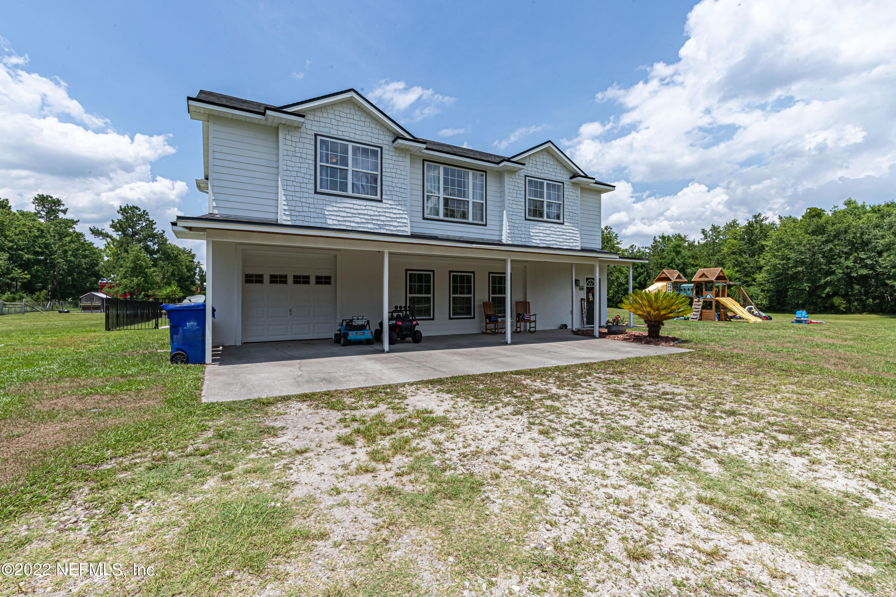 1830 Bennett Road St. Augustine, FL 32092 - Photo 30 of 45 front view of a house with a yard