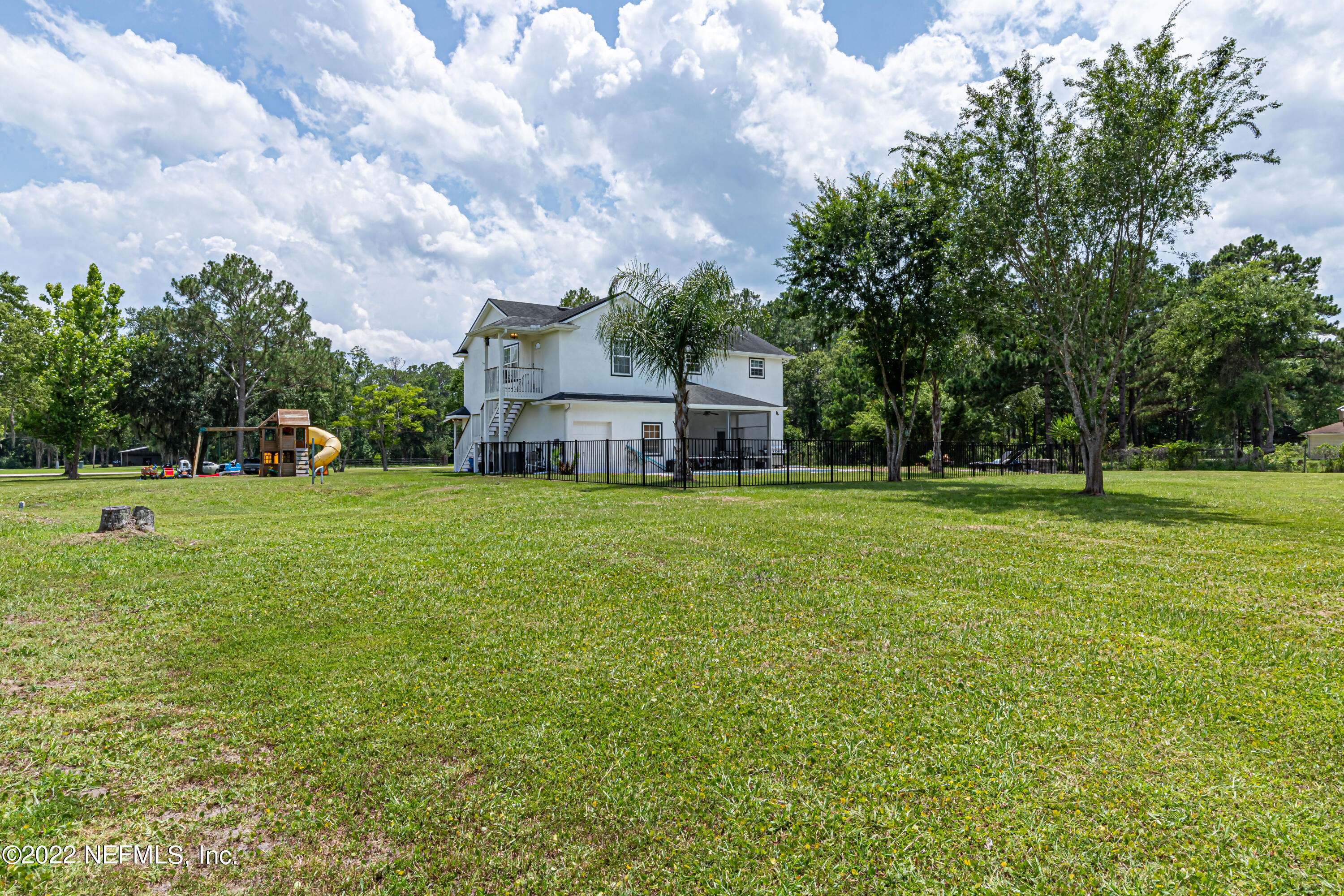 1830 Bennett Road St. Augustine, FL 32092 - Photo 31 of 45 a view of a house with a big yard