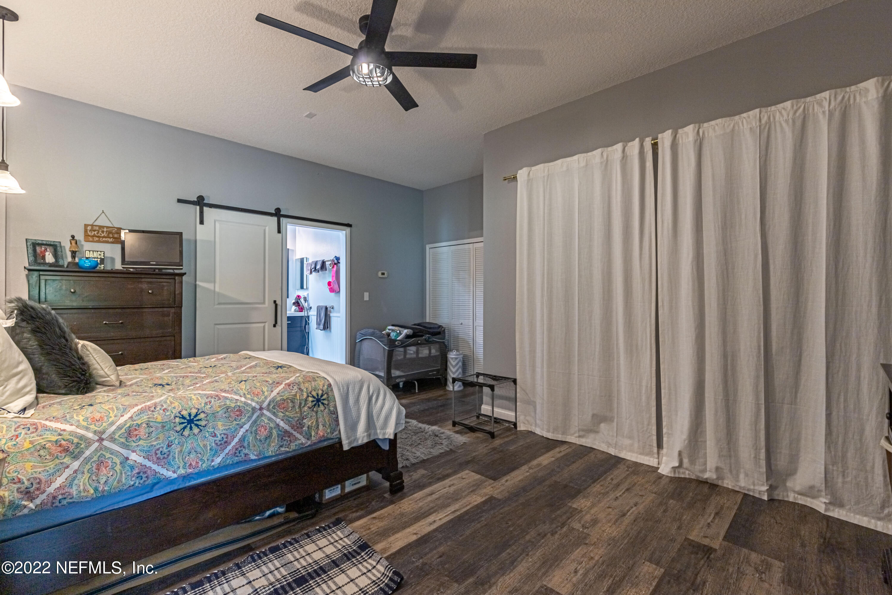 1830 Bennett Road St. Augustine, FL 32092 - Photo 37 of 45 a bedroom with a bed and a closet