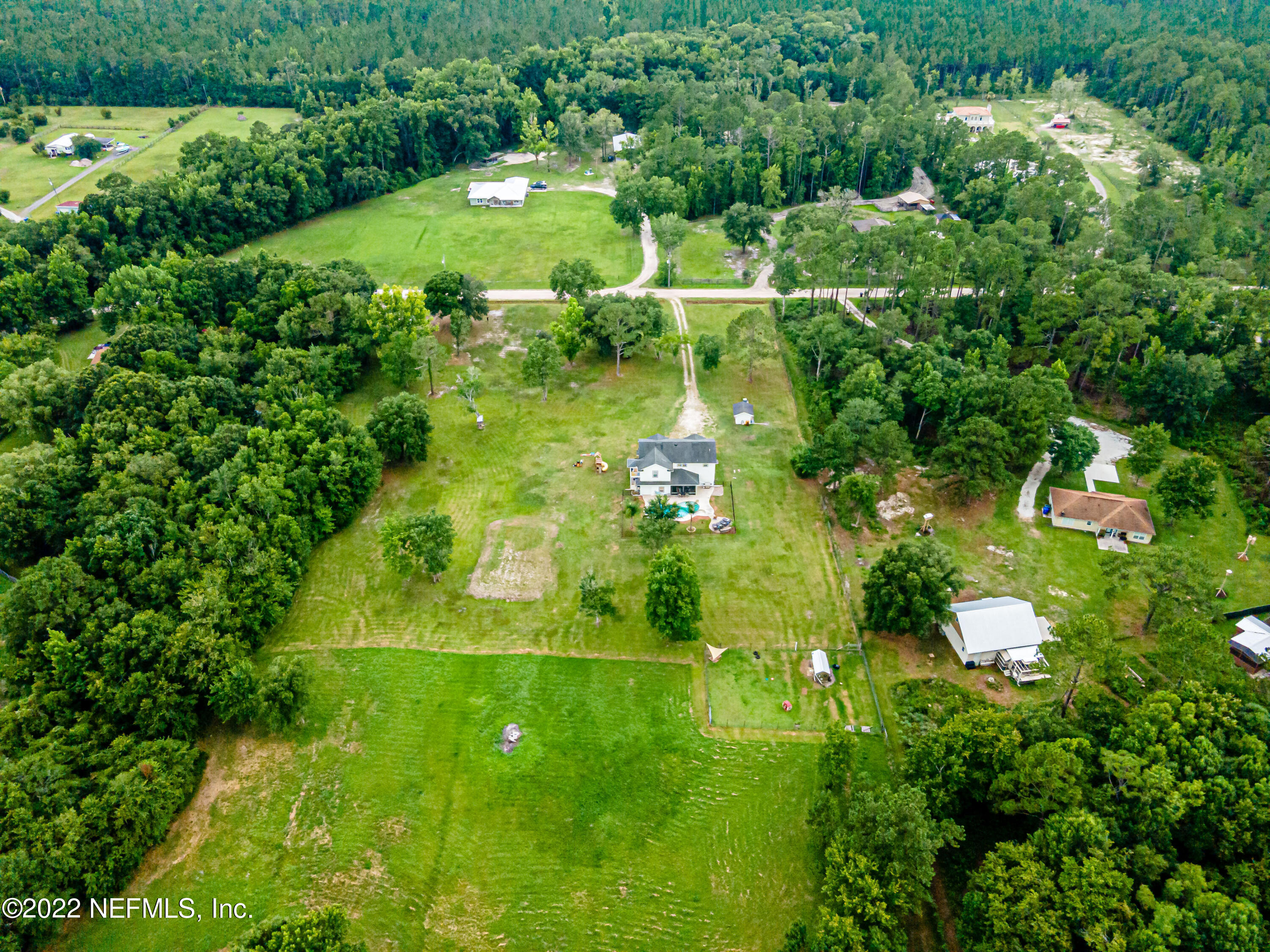 1830 Bennett Road St. Augustine, FL 32092 - Photo 43 of 45 a lush green forest with lots of trees