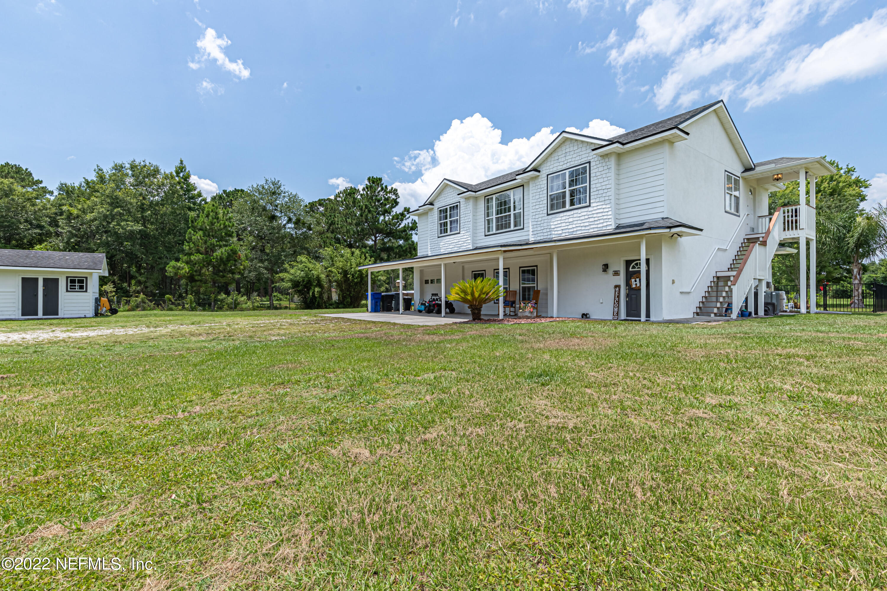 1830 Bennett Road St. Augustine, FL 32092 - Photo 5 of 45 a view of a house with a backyard