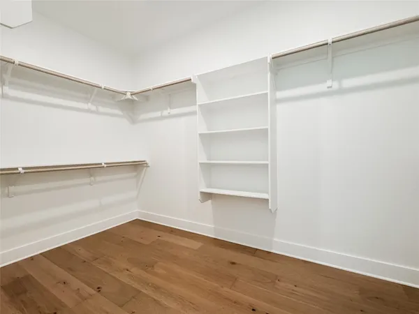 a view of an empty walk in closet