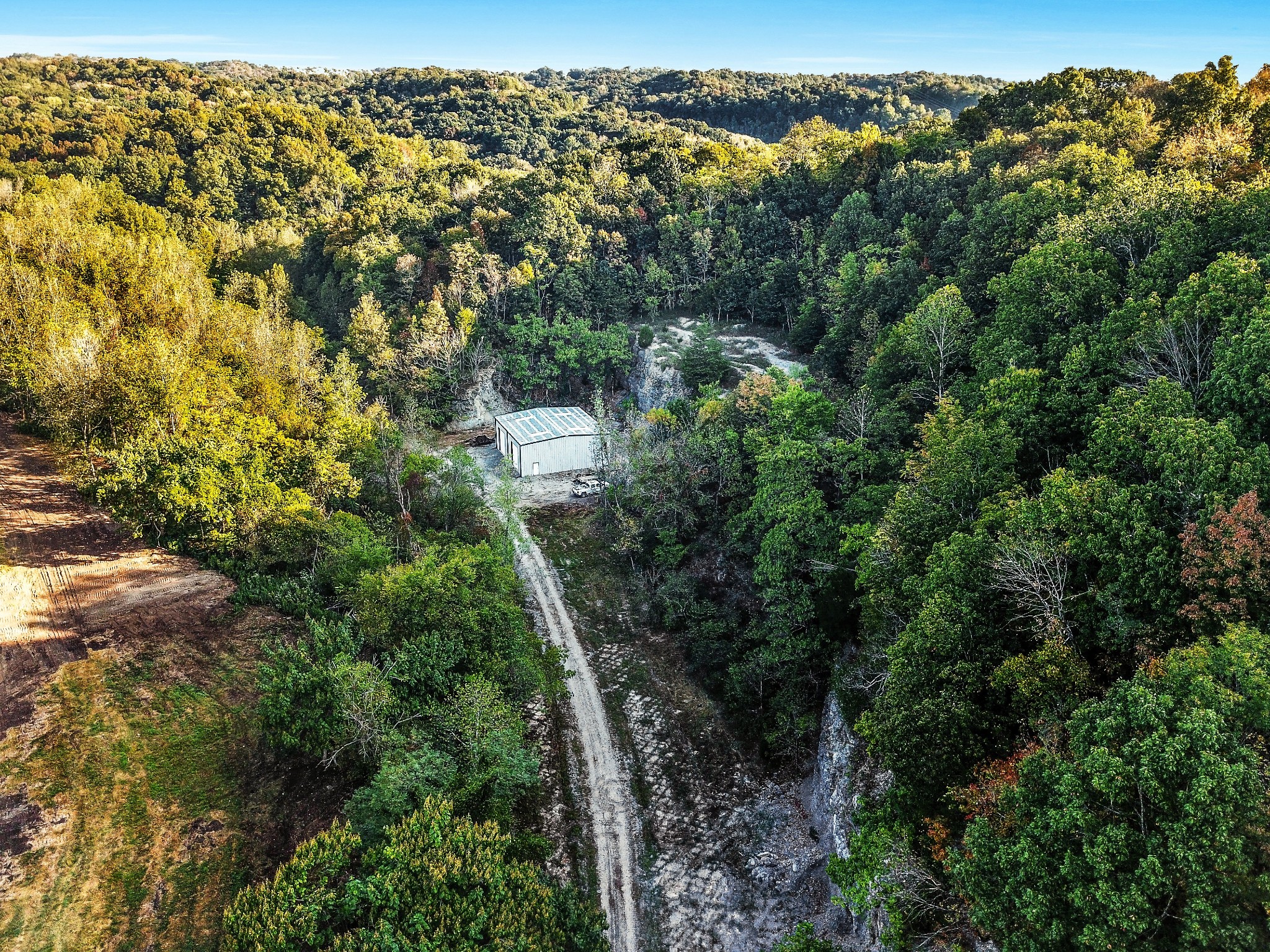 0 Baker Station Road Goodlettsville, TN 37072 - Photo 4 of 10 a view of a city with lush green forest