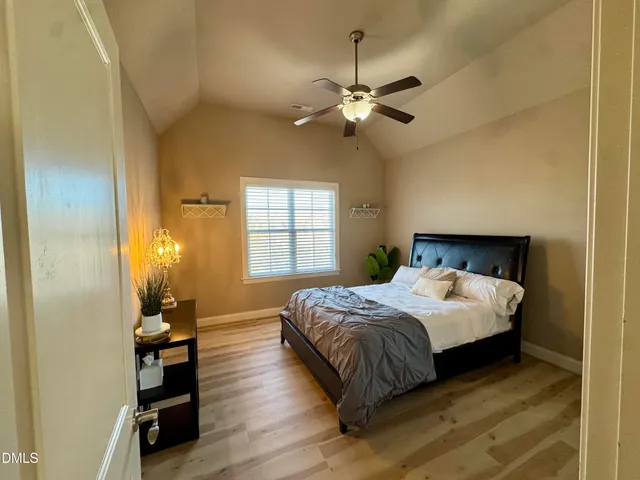 a bathroom with a tub and a shower