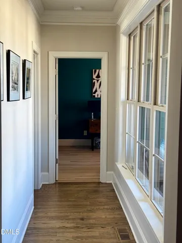 a view of a two chairs in the balcony