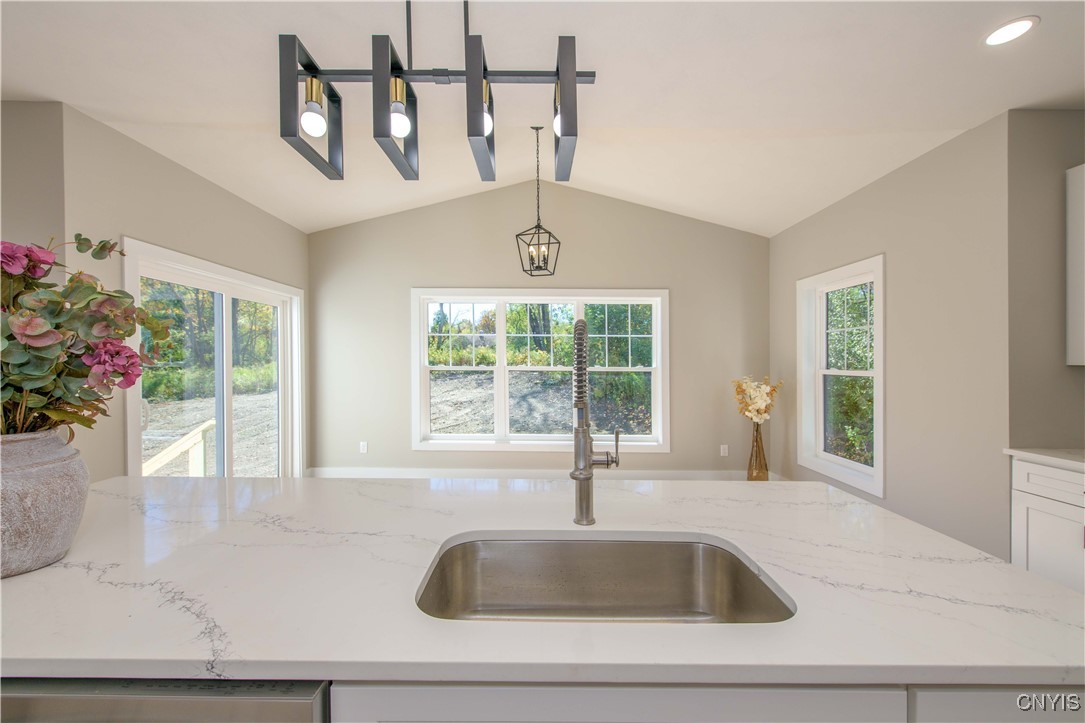 4792 Countryside Drive Onondaga, NY 13215 - Photo 11 of 42 Kitchen with beautiful quartz countertops!