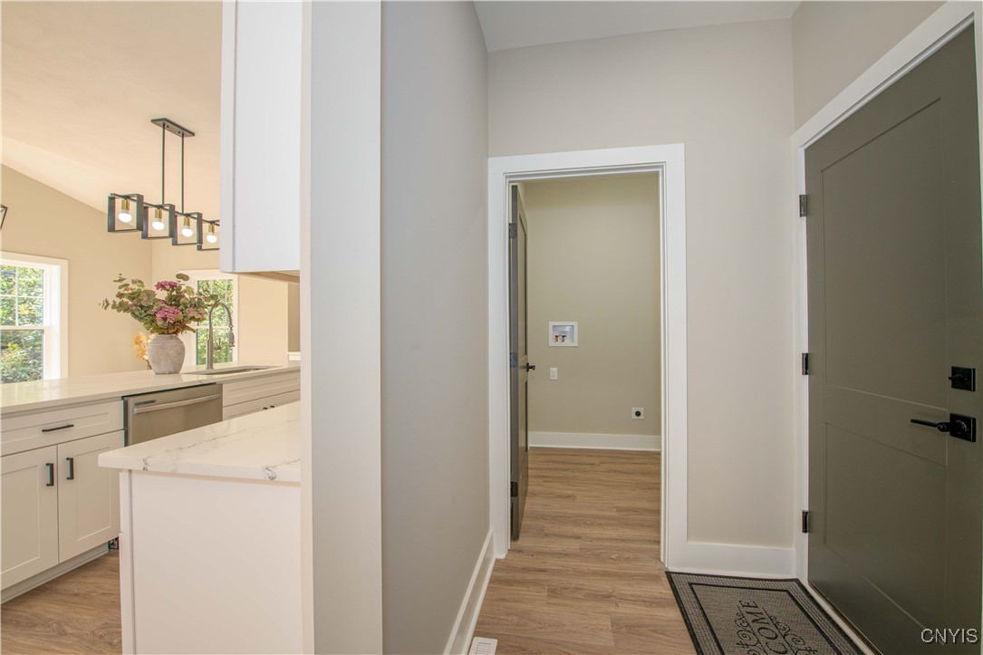 4792 Countryside Drive Onondaga, NY 13215 - Photo 14 of 42 Kitchen, Laundry Room, Entry to Garage