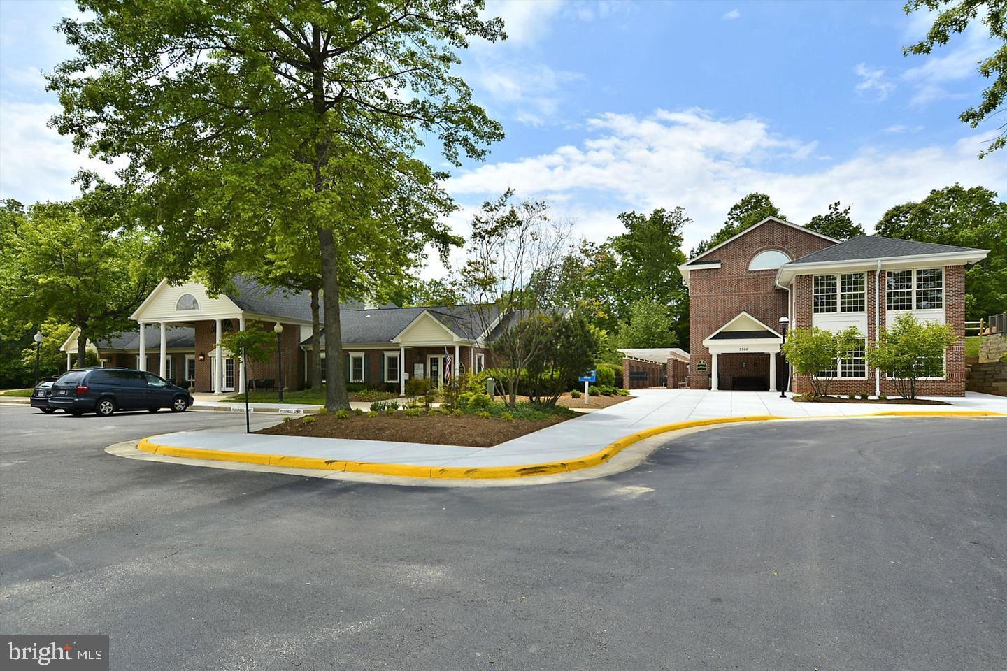 3805 Green Ridge Court, Unit 201 Fairfax, VA 22033 - Photo 19 of 25 a front view of house with yard and swimming pool