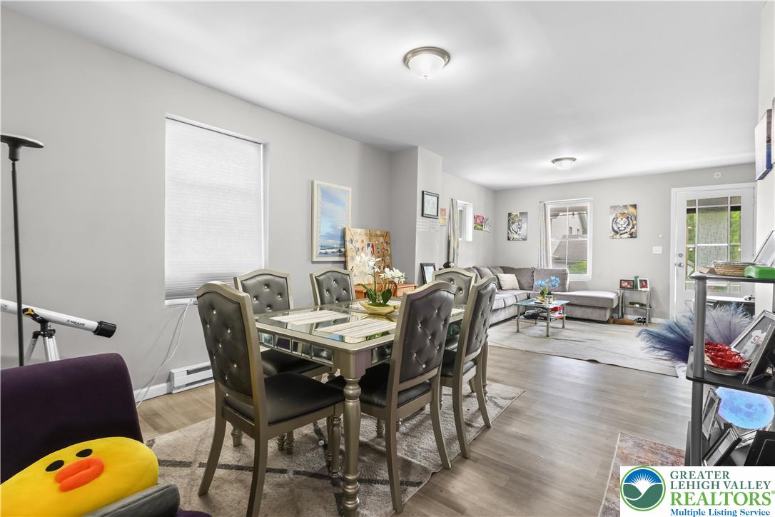 12 South Front Street Coplay, PA 18037 - Photo 7 of 41 This open concept living and dining area offers both comfort and entertaining space.