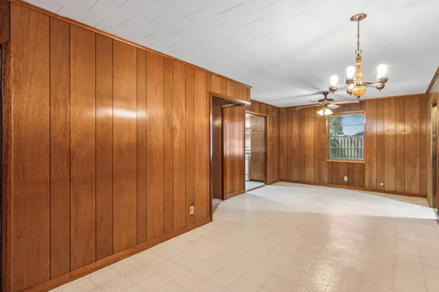 a view of a big room with a chandelier